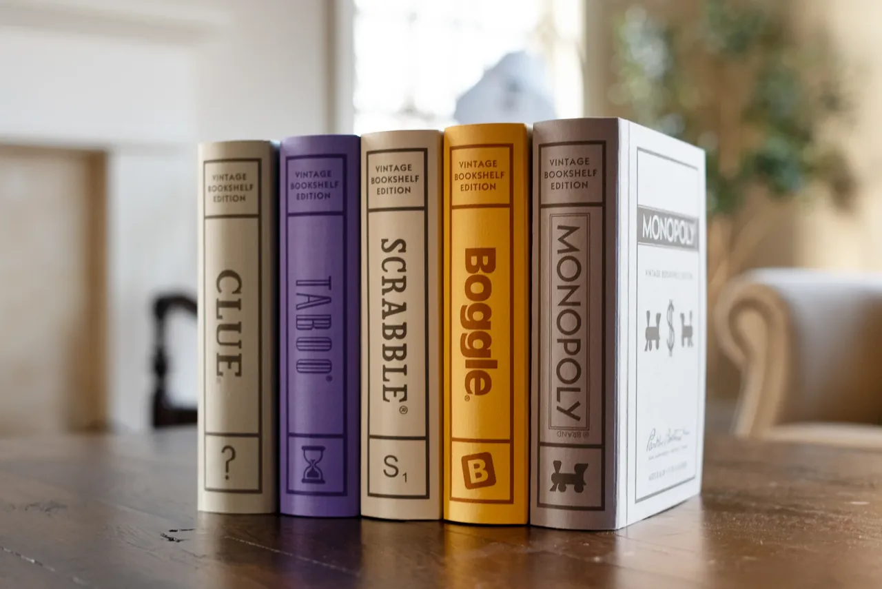 Close view of books arranged beside decorative objects